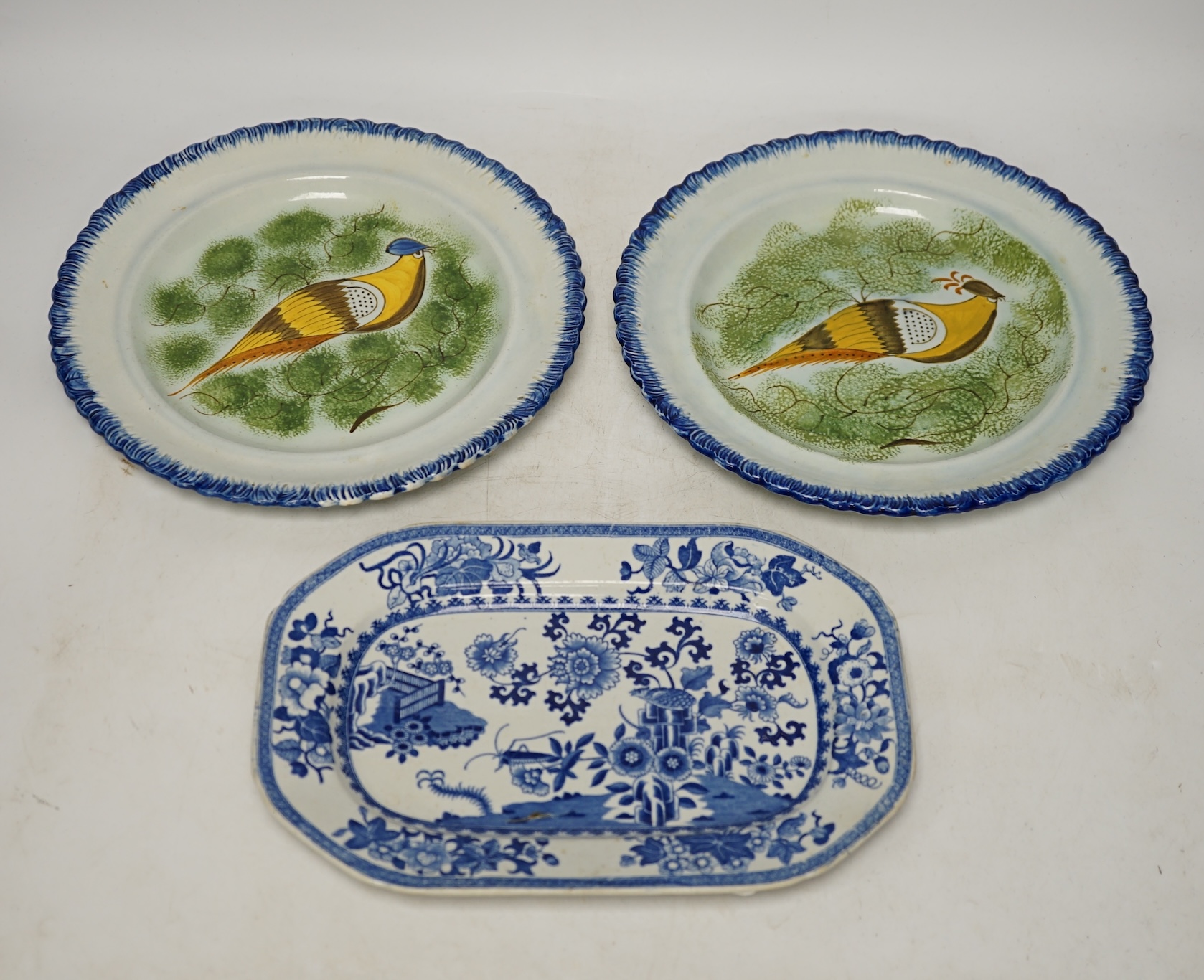 A set of six Yorkshire pearlware ‘bird’ plates, c.1800, and a Spode blue printed octagonal serving dish, largest 25cm in diameter. Condition - fair